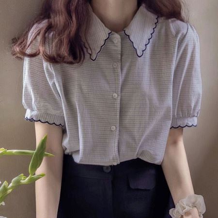 A selection of Dongdaemum Women’s Shirts & Tops, showcasing the best of Korean fashion.