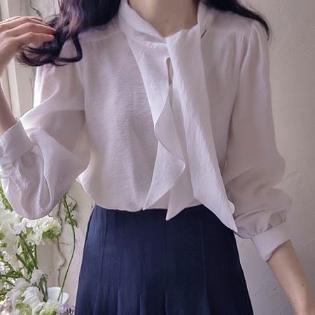 A selection of Dongdaemum Women’s Shirts & Tops, showcasing the best of Korean fashion.