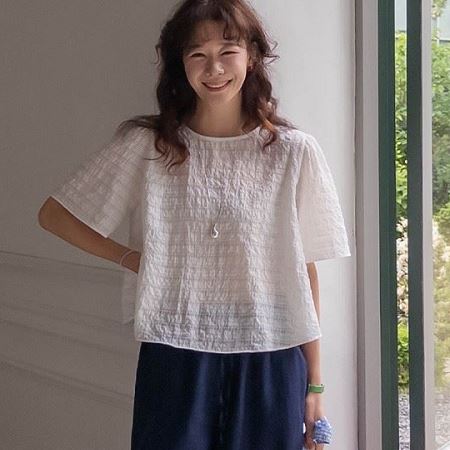 A selection of Dongdaemum Women’s Shirts & Tops, showcasing the best of Korean fashion.