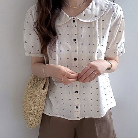 A selection of Dongdaemum Women’s Shirts & Tops, showcasing the best of Korean fashion.