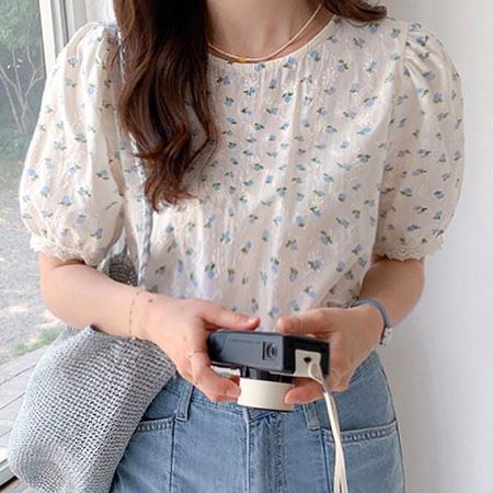 A selection of Dongdaemum Women’s Shirts & Tops, showcasing the best of Korean fashion.