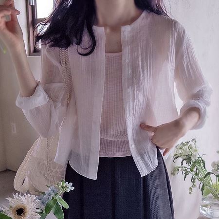 A selection of Dongdaemum Women’s Shirts & Tops, showcasing the best of Korean fashion.