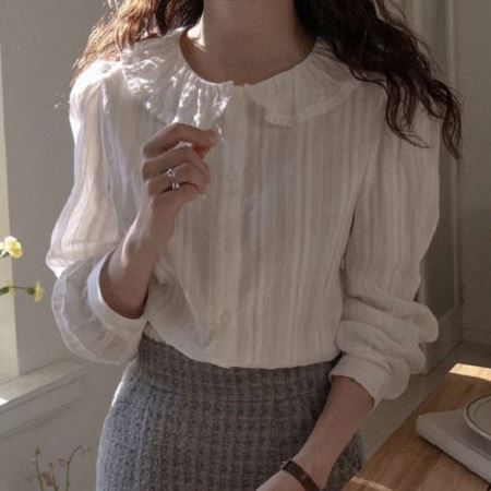 A selection of Dongdaemum Women’s Shirts & Tops, showcasing the best of Korean fashion.