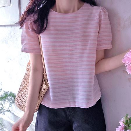A selection of Dongdaemum Women’s Shirts & Tops, showcasing the best of Korean fashion.
