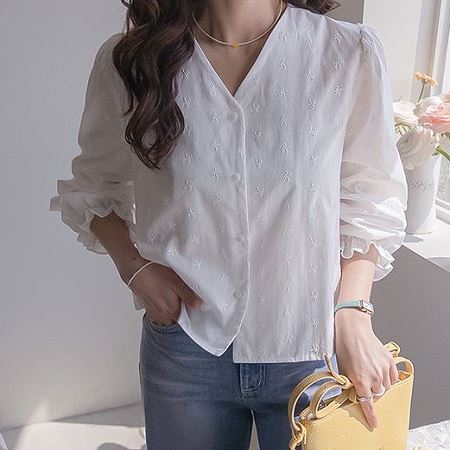 A selection of Dongdaemum Women’s Shirts & Tops, showcasing the best of Korean fashion.