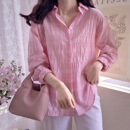 A selection of Dongdaemum Women’s Shirts & Tops, showcasing the best of Korean fashion.