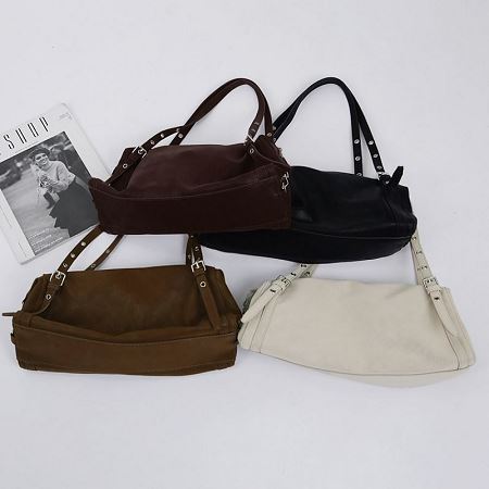 A collection of Dongdaemum Women’s Handbags, Wallets & Cases, showcasing the elegance of Korean fashion.