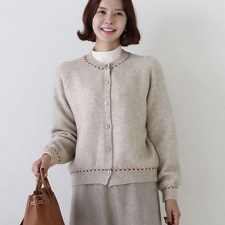 A variety of Dongdaemum Women’s Coats & Jackets, reflecting the sophistication of Korean fashion.