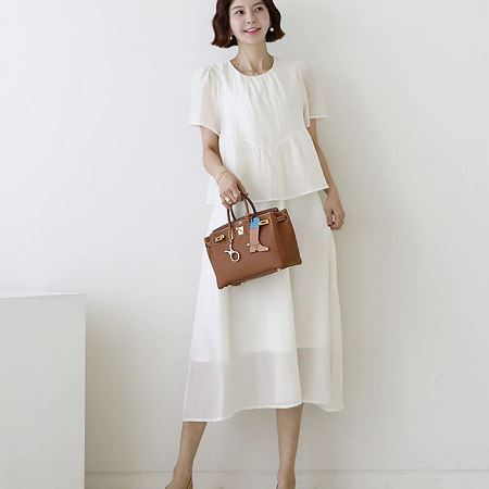 A collection of Dongdaemum Women’s Dresses, encapsulating the charm of Korean fashion.