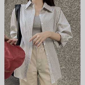 A selection of Dongdaemum Women’s Shirts & Tops, showcasing the best of Korean fashion.