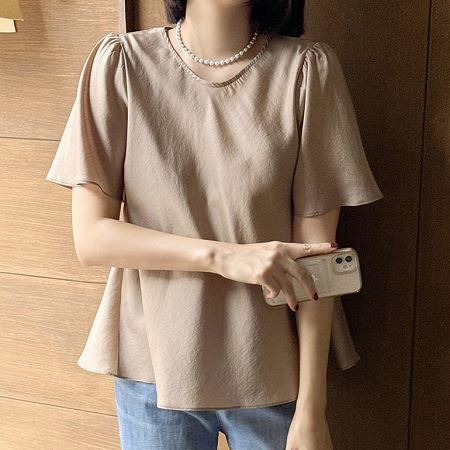 A selection of Dongdaemum Women’s Shirts & Tops, showcasing the best of Korean fashion.