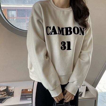 A selection of Dongdaemum Women’s Shirts & Tops, showcasing the best of Korean fashion.