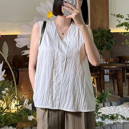 A selection of Dongdaemum Women’s Shirts & Tops, showcasing the best of Korean fashion.