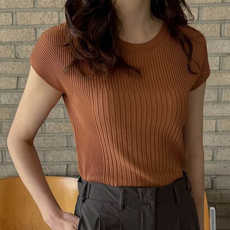 A selection of Dongdaemum Women’s Shirts & Tops, showcasing the best of Korean fashion.
