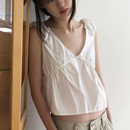 A selection of Dongdaemum Women’s Shirts & Tops, showcasing the best of Korean fashion.