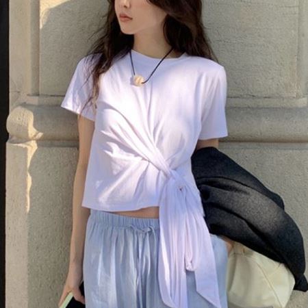 A selection of Dongdaemum Women’s Shirts & Tops, showcasing the best of Korean fashion.