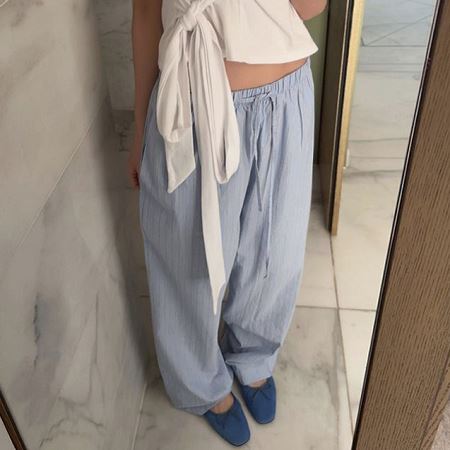 An array of Dongdaemum Women’s Pants, embodying the versatility of Korean fashion.