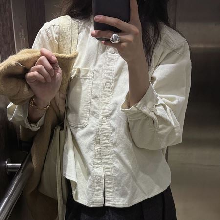 A selection of Dongdaemum Women’s Shirts & Tops, showcasing the best of Korean fashion.