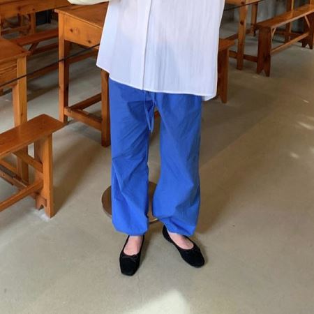 An array of Dongdaemum Women’s Pants, embodying the versatility of Korean fashion.