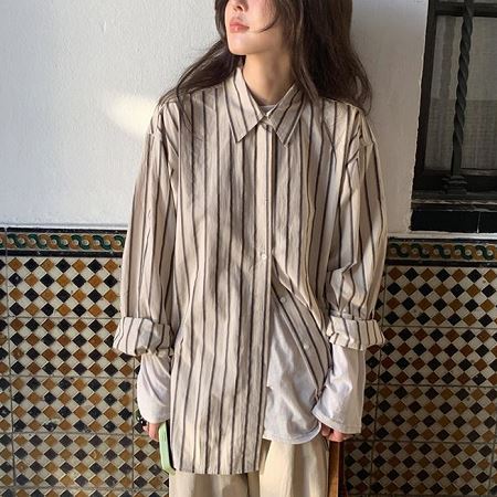 A selection of Dongdaemum Women’s Shirts & Tops, showcasing the best of Korean fashion.