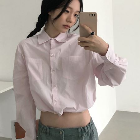 A selection of Dongdaemum Women’s Shirts & Tops, showcasing the best of Korean fashion.