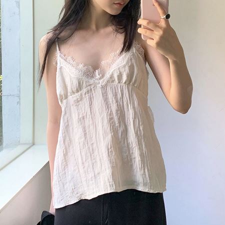 A selection of Dongdaemum Women’s Shirts & Tops, showcasing the best of Korean fashion.