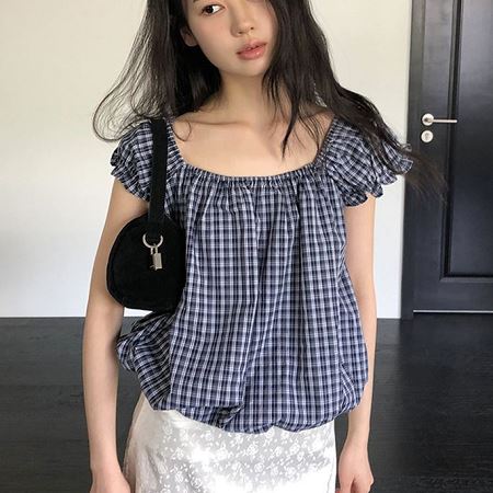 A selection of Dongdaemum Women’s Shirts & Tops, showcasing the best of Korean fashion.