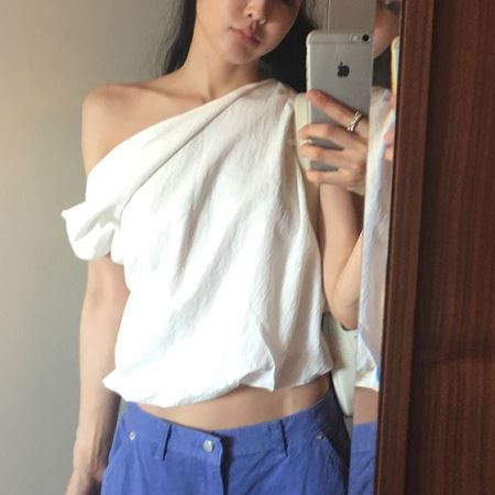 A selection of Dongdaemum Women’s Shirts & Tops, showcasing the best of Korean fashion.