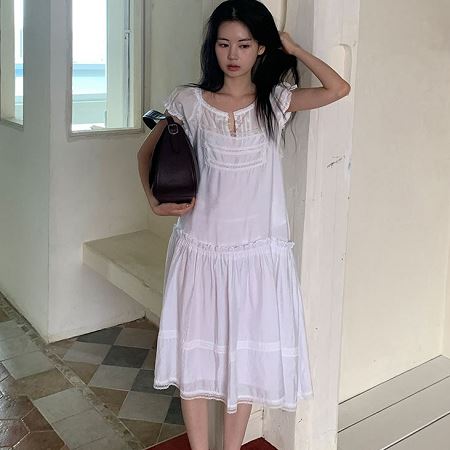 A collection of Dongdaemum Women’s Dresses, encapsulating the charm of Korean fashion.