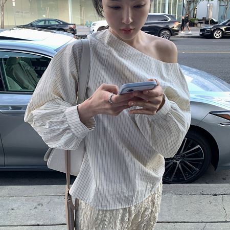 A selection of Dongdaemum Women’s Shirts & Tops, showcasing the best of Korean fashion.