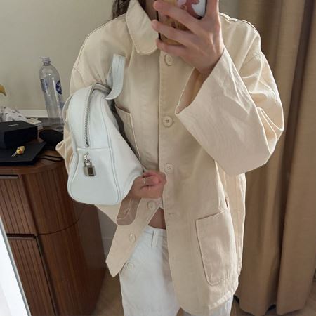 A variety of Dongdaemum Women’s Coats & Jackets, reflecting the sophistication of Korean fashion.