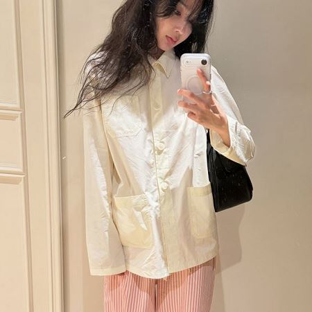 A selection of Dongdaemum Women’s Shirts & Tops, showcasing the best of Korean fashion.