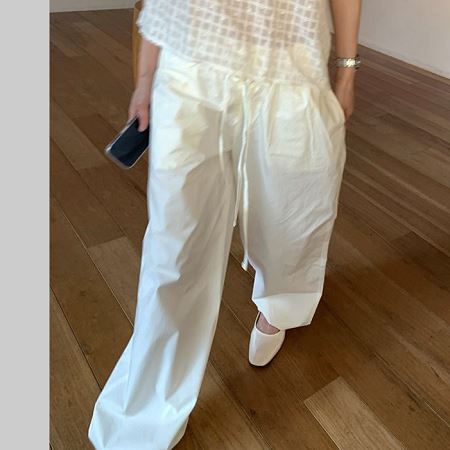 An array of Dongdaemum Women’s Pants, embodying the versatility of Korean fashion.