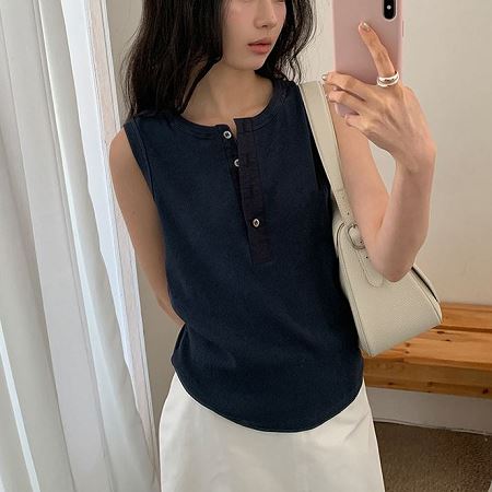 A selection of Dongdaemum Women’s Shirts & Tops, showcasing the best of Korean fashion.