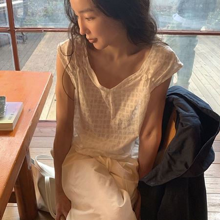 A selection of Dongdaemum Women’s Shirts & Tops, showcasing the best of Korean fashion.