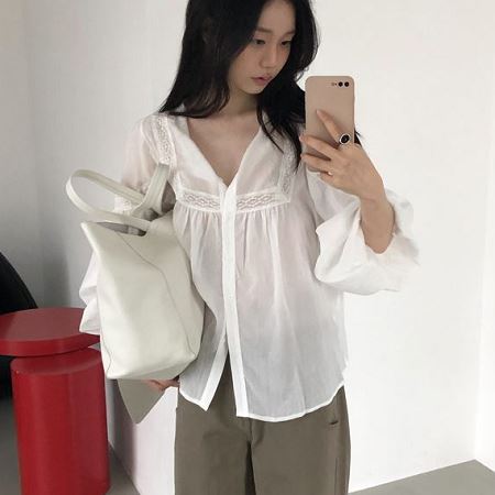 A selection of Dongdaemum Women’s Shirts & Tops, showcasing the best of Korean fashion.