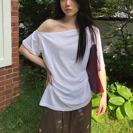 A selection of Dongdaemum Women’s Shirts & Tops, showcasing the best of Korean fashion.