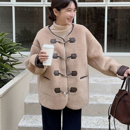 A variety of Dongdaemum Women’s Coats & Jackets, reflecting the sophistication of Korean fashion.