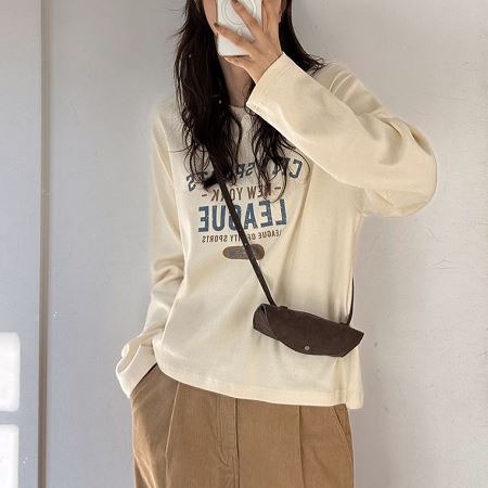 A selection of Dongdaemum Women’s Shirts & Tops, showcasing the best of Korean fashion.