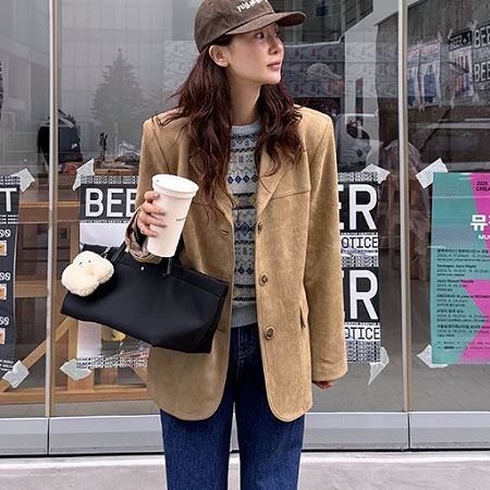 A variety of Dongdaemum Women’s Coats & Jackets, reflecting the sophistication of Korean fashion.