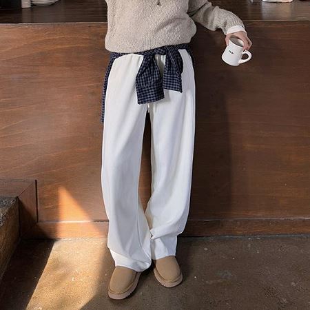 An array of Dongdaemum Women’s Pants, embodying the versatility of Korean fashion.