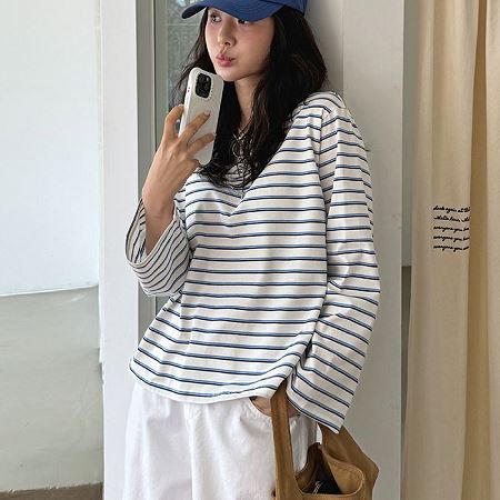 A selection of Dongdaemum Women’s Shirts & Tops, showcasing the best of Korean fashion.
