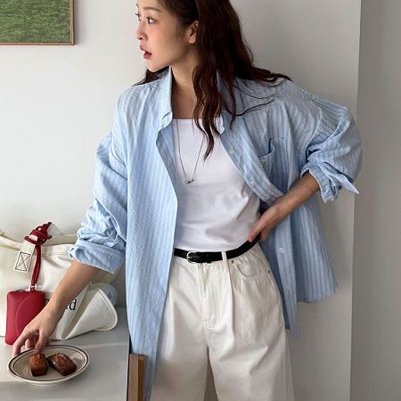 A selection of Dongdaemum Women’s Shirts & Tops, showcasing the best of Korean fashion.