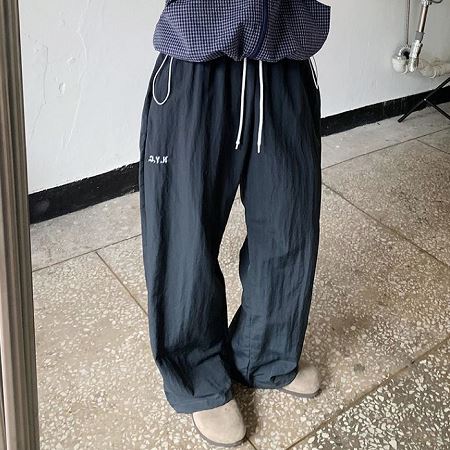 An array of Dongdaemum Women’s Pants, embodying the versatility of Korean fashion.