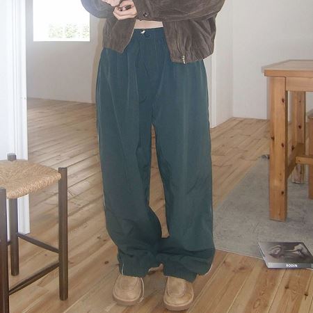 An array of Dongdaemum Women’s Pants, embodying the versatility of Korean fashion.