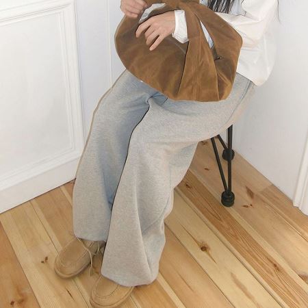 An array of Dongdaemum Women’s Pants, embodying the versatility of Korean fashion.