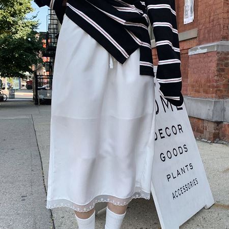 A collection of Dongdaemum Women’s Dresses, encapsulating the charm of Korean fashion.