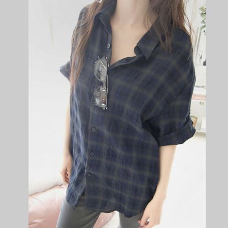 A selection of Dongdaemum Women’s Shirts & Tops, showcasing the best of Korean fashion.
