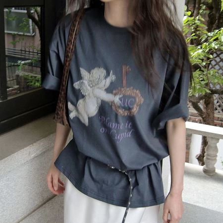 A selection of Dongdaemum Women’s Shirts & Tops, showcasing the best of Korean fashion.