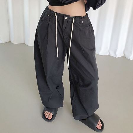 An array of Dongdaemum Women’s Pants, embodying the versatility of Korean fashion.
